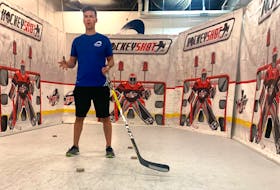 Josh Andrews from Andrews Hockey Growth Programs gives instructions before a puck control drill Monday. The Charlottetown hockey school, which has had notable alumni like Nathan MacKinnon and Sidney Crosby, has shifted to virtual lessons due to COVID-19 restrictions. Contributed