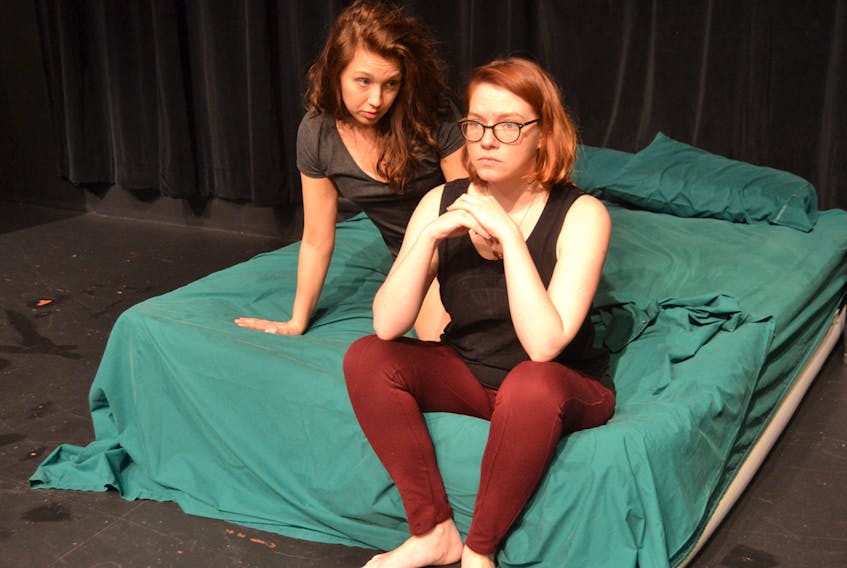 Actors Katie Kerr, left, and Becca Griffin appear in a rehearsal scene for “Bolero”. This one act play is in “Time Flies”, a show of five one-act comedies by David Ives. It’s part of the Pay What You Can Theatre Festival, running Feb. 23, 24, 28 and March 2-3 at 7:30 p.m. and Feb. 25 at 2 p.m. SALLY COLE/THE GUARDIAN
