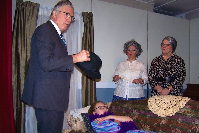 Detective Dennis O’Finn (Gordon MacMillan), left, investigates the murder scene in “Any Body for Tea?”. It’s the Murray Players entry in the P.E.I. Community Theatre Festival on Saturday at the Carrefour Theatre in Charlottetown. From left are Jaime Gardner (Elizabeth Ellsworth) Bertie Beauregard (Donna Penny) and Hildegarde Hodge (Mary-Lou MacLure). JOHN HARDY/SUBMITTED PHOTO
