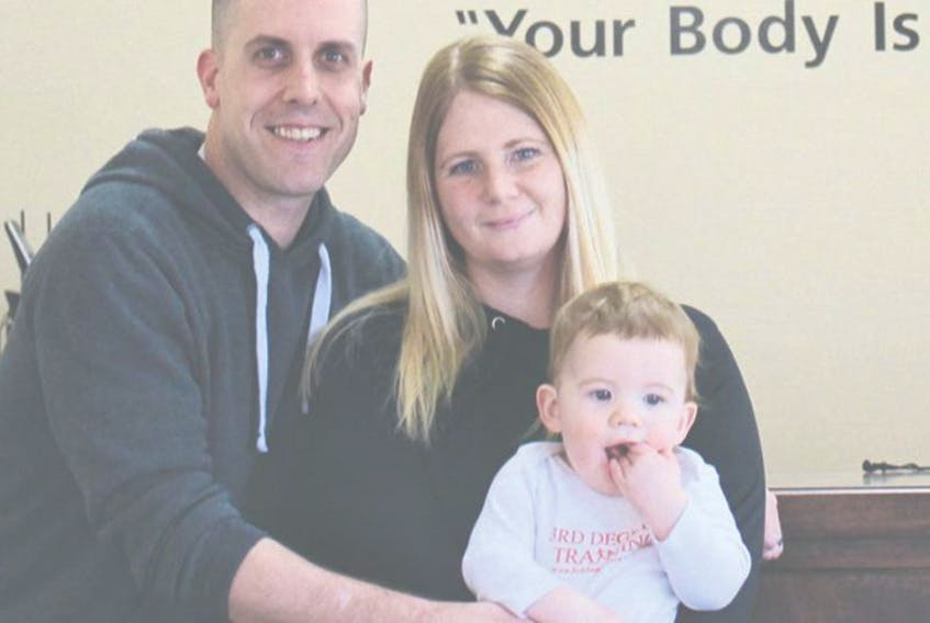<p><span class="Normal">Steve Collette, left, Pam Collette and 11-month-old son Lukin are enthusiastic about the opening of 3RD Degree Training’s new franchise in Montague.</span></p>
<div><span class="Normal"><br /></span></div>