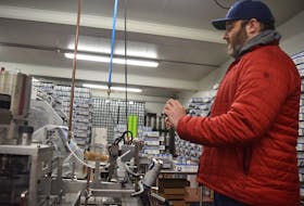 Alex Rice, president and founder of Nova Scotia Spirit Co. in Trenton, visits the Blue Lobster vodka soda canning line. The Nova Scotia Liquor Corp. reported Tuesday that sales of alcoholic beverages like the coolers have taken off. File - Brendan Ahern - Saltwire Network