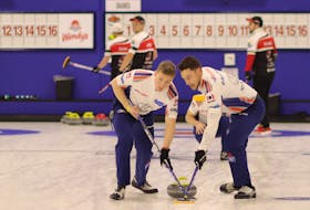Ryan McNeil Lamswood (left) and Brett Gallant sweep a shot for Team Gushue during a game at the 2020 Stu Sells 1824 Halifax Classic last fall. McNeil Lamswood filled in for regular lead Geoff Walker, providing skip Brad Gushue, third Mark Nichols and Gallant a chance to assess the young men they would eventually choose as their alternate for the 2021 Brier. — Contributed