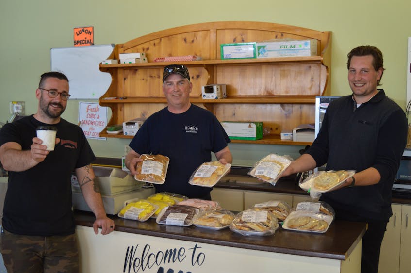 Three Charlottetown businesses have teamed up to deliver free baked goods to front-line workers. From left, are Sean Bruinooge, co-owner of Receiver Coffee, Jamie Doyle, owner of MacAulay’s Bakery & Deli, and Amex Smith, vice-president of operations of the Figr cannabis plant in the biocommons park.