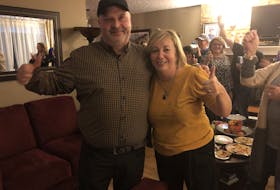 Darren O'Quinn celebrates winning the District 11 seat with his wife Nancy and supporters gathered at this house in New Waterford on Saturday evening.