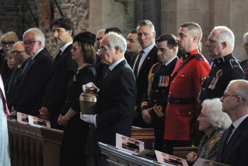 STJ funeral main pic:
Funeral director Geoff Carnell carries Urn with the remains of John Crosbie at Thursday afternoon’s funeral service. At lower right is Crosbie’s widow Jane and their son Ches Crosbie. At left and to the right of Carnell is Her Honour, Judy Foote, NL Lieutenant Governor, Prime Minister Justin Trudeau and former Prime Minister Joe Clark and Senator George Furey.
-Photo by Joe Gibbons/The Telegram