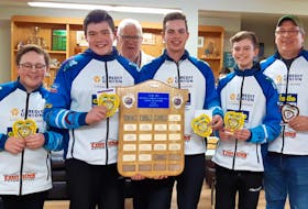 The Brayden Snow-skipped rink from the Charlottetown Curling Club recently won the P.E.I. under-18 boys curling championship at the Western Community Curling Club in Alberton. Host club president Fr. Art Pendergast, back, congratulates team members, from left: Snow, third stone Jack MacFadyen, second stone Liam Barbrick, lead Davis Nicholson and coach David MacFadyen.