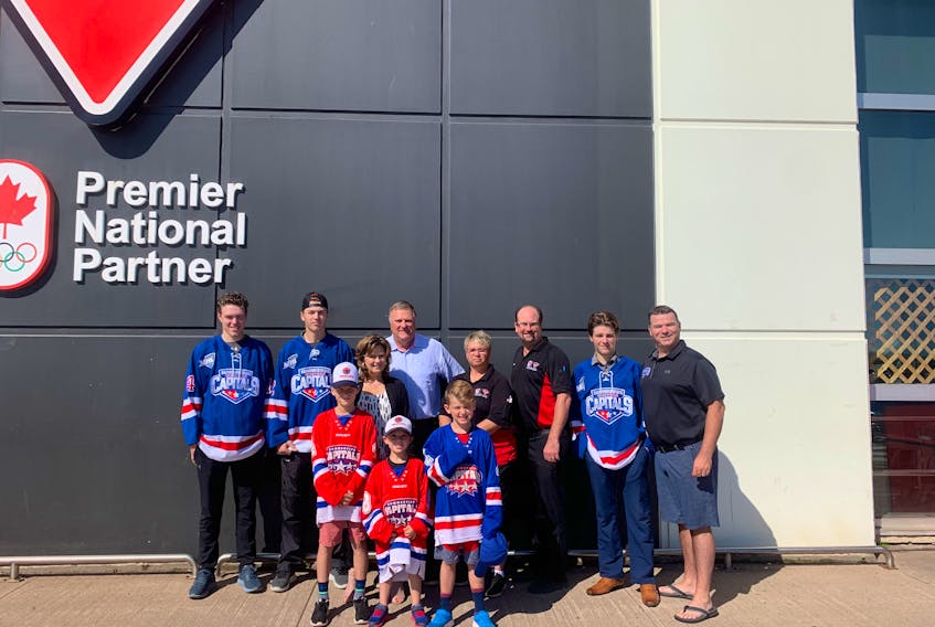 The Summerside Western Capitals and Canadian Tire of Summerside recently announced a partnership that will provide season tickets to all Summerside Minor Hockey players for the 2019-20 Maritime Junior Hockey League season. Taking part in the recent announcement were, front row, from left: Summerside Minor Hockey players Dylan Wile, Charlie Gallant and Clarke McGuigan. Back row: Caps forward Zach Thususka; Caps forward Colby MacArthur; Claudette Landry and Claude Landry, owners of Canadian Tire; Mary-Lynn Forest, store manager; Peter Cusack, general manager; Caps defenceman Ed McNeill, and Caps head coach Billy McGuigan.