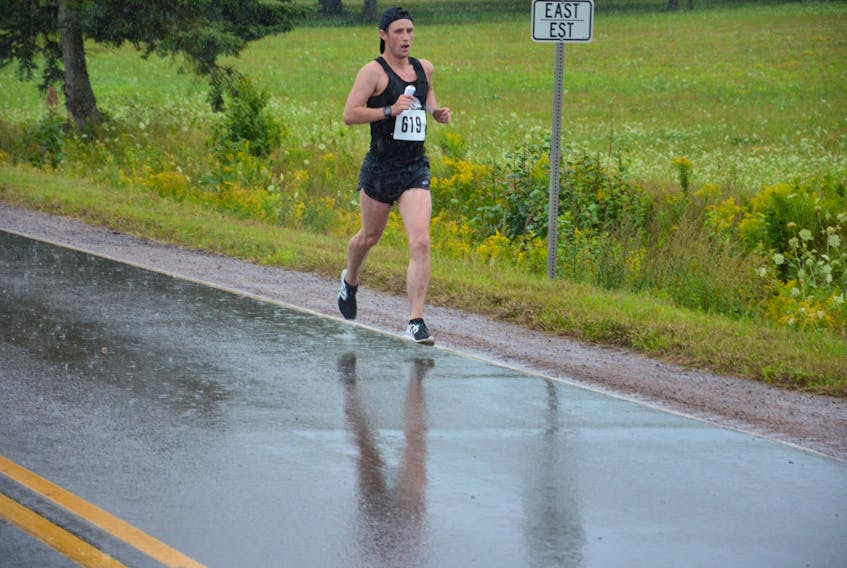 Rainy and windy conditions did not stop Winsloe native Brandon Higginbotham from winning his first-ever Malpeque Bay Credit Union Harvest Festival Road Race in 2018. His time was one hour 31 minutes 52 seconds (1:31:52).