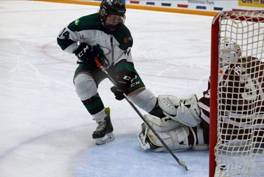 Lexie Murphy scores a goal for Team P.E.I. at the 2019 Canada Winter Games.