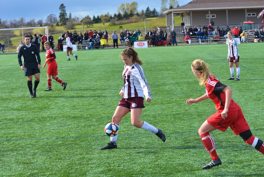 The Holland Hurricanes’ Paige Deighan, white jersey, in action against the UNBSJ Seawolves during a semifinal game in the Atlantic Collegiate Athletic Association (ACAA) women’s soccer championship at the Terry Fox Sports Complex in Cornwall on Oct. 26. The Hurricanes went on to win the conference title and opened play at the 2019 Canadian Collegiate Athletic Association (CCAA) women’s soccer championship in Edmonton on Wednesday.