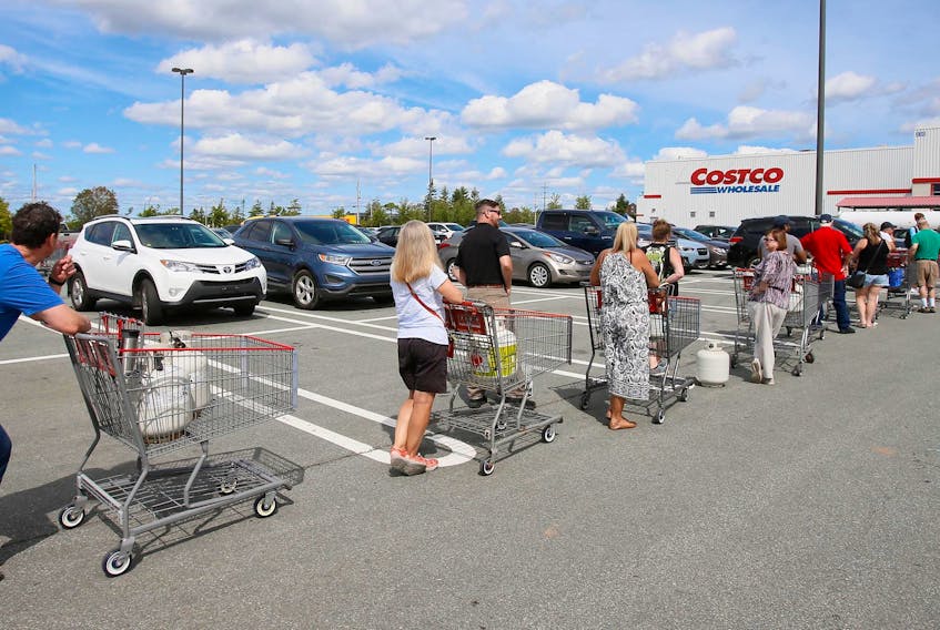Customers line up for propane at Costco Bayer’s Lake, as Nova Scotians prepare for hurricane Dorian.