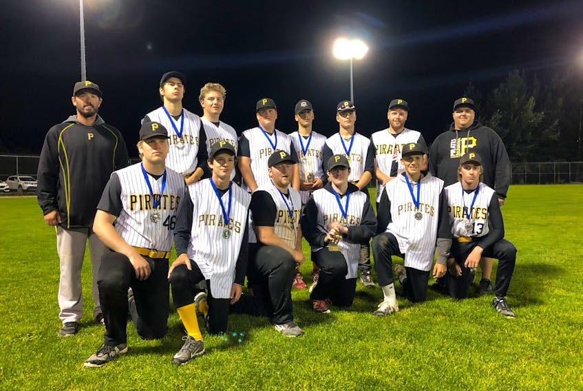 Pasadena Pirates coach Greg Whelan, left, is seen here with his Under-18 team. He has coached most of the players on this team since they were in T-Ball. CONTRIBUTED