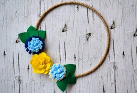 Trying new routines and crafts can help get over the winter/February blues. Gina Bell recently created this spring felt flower wreath.  CONTRIBUTED