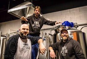 Instead of viewing down time caused by COVID-19 restrictions as a negative, Off Track Brewing co-owners Allan MacKay, left, Jon Saunders, centre, and Matt Scott used it as an opportunity to make renovations and expand their indoor space. Larry Peyton Photography