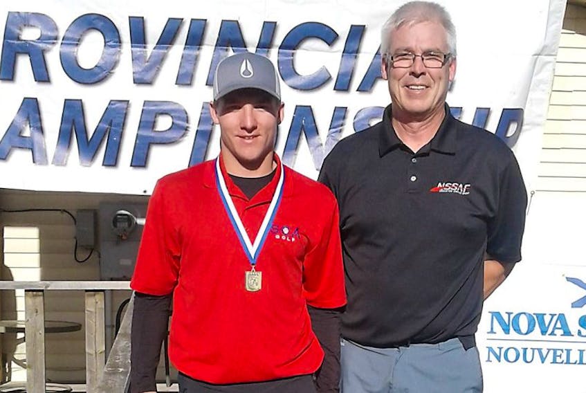 Austin McBurnie of South Colchester Academy won the NSSAF golf title by two strokes this week at Paragon Golf and Country Club in Kingston. Stephen Gallant, executive director of the NSSAF, presented McBurnie with his gold medal.