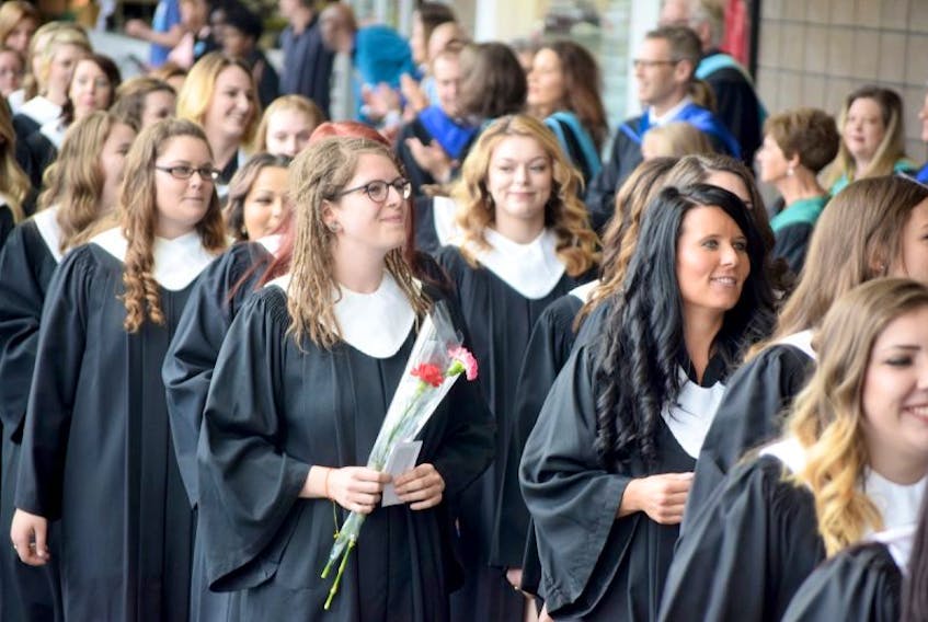Graduating NSCC students march into the Rath Eastlink Community Centre applauded by the faculty of the Truro campus Tuesday.