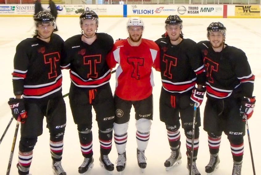 Zach Sill, middle, attended Bearcats training camp to work on conditioning prior to the Washington Capitals training camp. Sill, a former Bearcat, is always willing to talk and share experiences. Pictured from left, are Campbell Pickard, Elliott MacIsaac, Sill, Noah Archibald and Daniel Little.