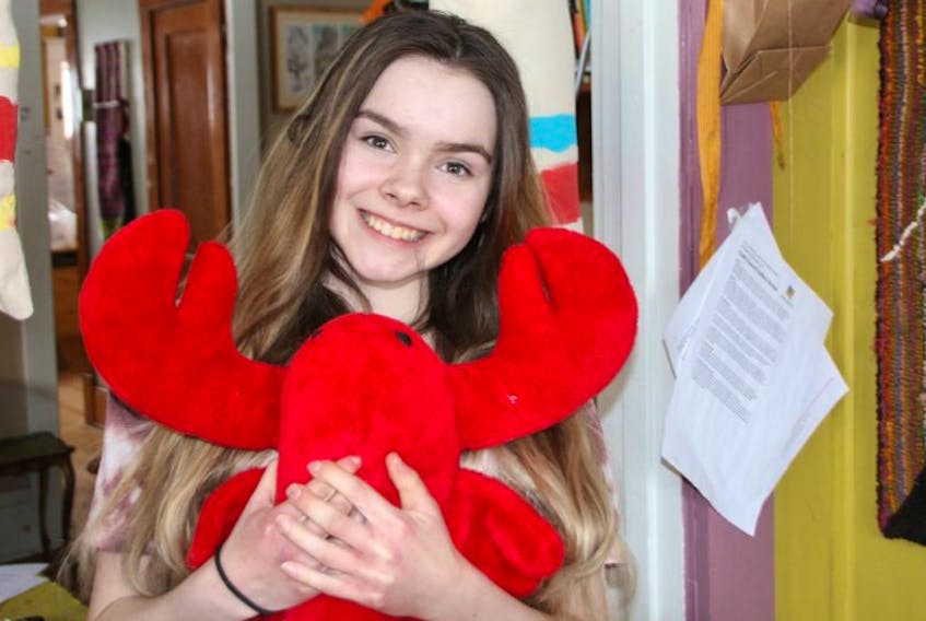 Zoe Morgan used a variety of items representing local culture in the video she created for the Canada 150 and Me competition. She also sang a song she wrote in the video, which earned her a trip to Montreal.