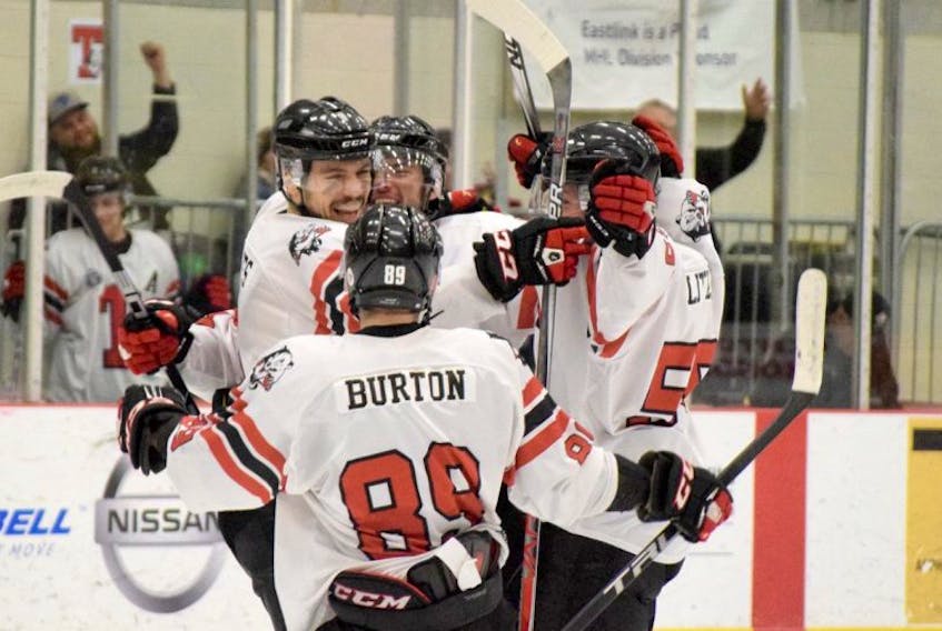 The Truro Bearcats celebrate a second-period shorthanded goal by Brandon Hughes during their 5-4 victory on Monday against the Amherst Ramblers.
