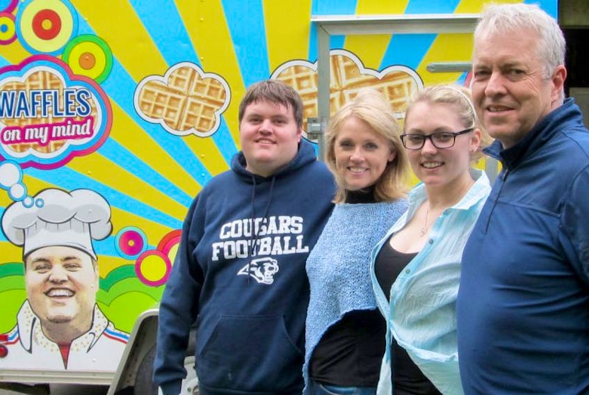 Seen here with the waffle truck are, from left, Colm, Lori, Alexandra and Eric Storr – The Waffles On My Mind team.