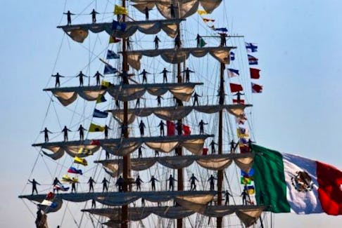 Crew members line the masts of the Mexican Navy Tall Ship ARM Cuauhtemoc as it arrived in Halifax last May.