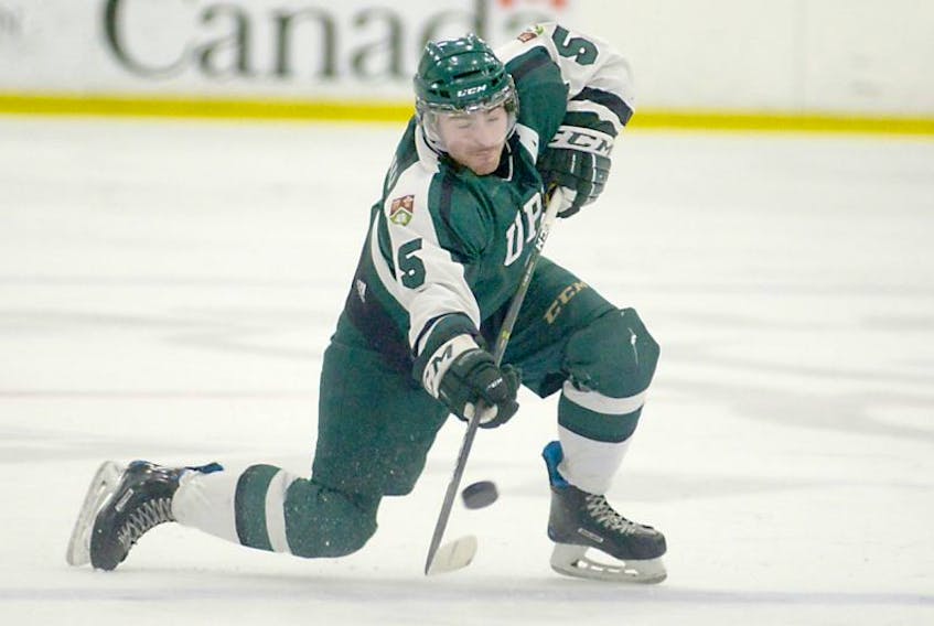 UPEI Panthers defenceman Casey Babineau keeps the puck in at the blueline during recent AUS hockey action.