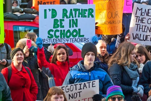 Students rally in support of teachers outside Province House Monday.
