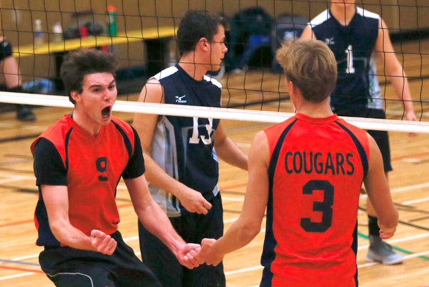 Sean Gallie of the CEC Cougars reacts after a kill against Ecole Secondaire de Par-en-Bas during their NSSAF volleyball championship final on Saturday.