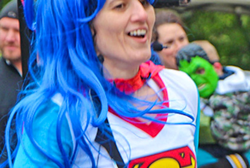Dr. Tania Sullivan dons her traditional superhero outfit for the annual Fighting Cancer Together fundraiser. She is one of the organizer’s for this weekend’s Together We Are More celebration. File