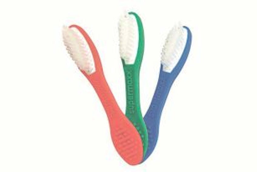 ['Samples of Supermaxx toothbrushes. The design of the toothbrush makes it difficult for one of them to be turned into a weapon. — Submitted image']