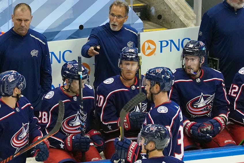 Blue Jackets head coach John Tortorella (centre) took some shots at the media in Toronto after Columbus eliminated Toronto from their play-in series on Sunday night.