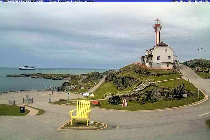The Cat ferry passes by the Cape Forchu lighthouse. Bay Ferries, operators of the Yarmouth-Portland ferry service, will be among the participants in a tourism information session to be held Thursday, May 31, at the Rodd Grand Hotel.