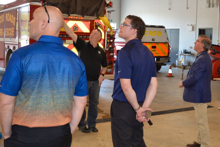 Kevin Reynolds, second from left, gives Charlottetown strategic priorities and intergovernmental affairs committee members a tour of the new Cross Roads Fire Department in Stratford recently. Reynolds is a volunteer firefighter and director of planning for the town. From left are Coun. Greg Rivard, Reynolds, Coun. Jason Coady and Mayor Philip Brown. 