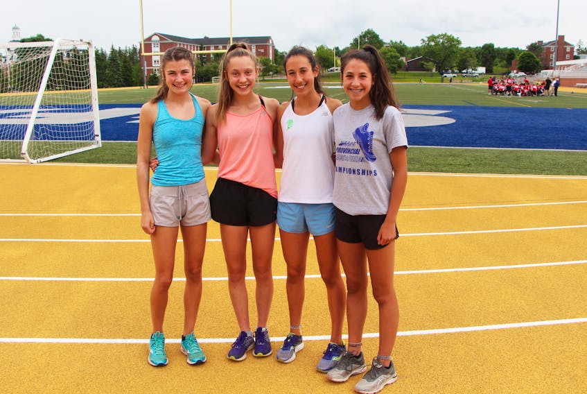 Four of the five Antigonish runners who are part of the 2019 Nova Scotia/Nunavut Legion Track and Field Team, gathered for a photo just prior to a workout July 23. Pictured are Siona Chisholm (left), Mairin Canning and sisters Malia and Mya Artibello. Unavailable on the day was Anna Robinson.