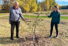 Stratford Mayor Steve Ogden and Emily Vanlderstine, co-ordinator of the Stratford Area Watershed Improvement Group, were among those who helped plant the trees that are part of the edible orchard at Fullerton’s Creek Conservation Park. 