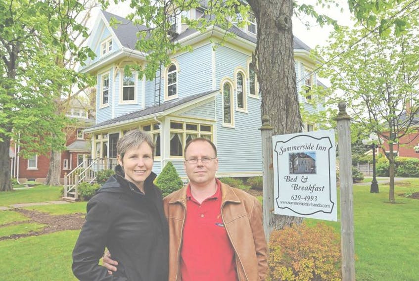 Ken and Jenny Meister in front of the Summerside Inn Bed and Breakfast shortly after buying the property.