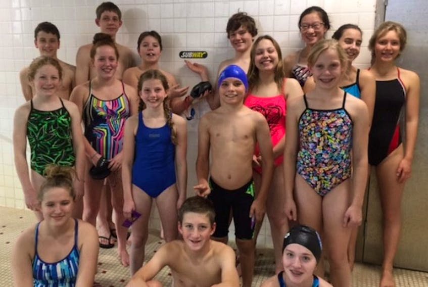 <p>Members of the Wolfville Tritons Swim Club celebrate success after the first meet of the year, which saw swimmers achieve 57 best times.</p>