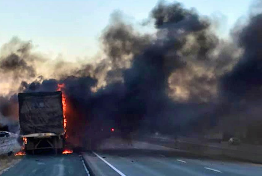 A tractor trailer caught fire Thursday morning on Highway 102 near Halifax Stanfield International Airport. (JEFF DONALDSON)