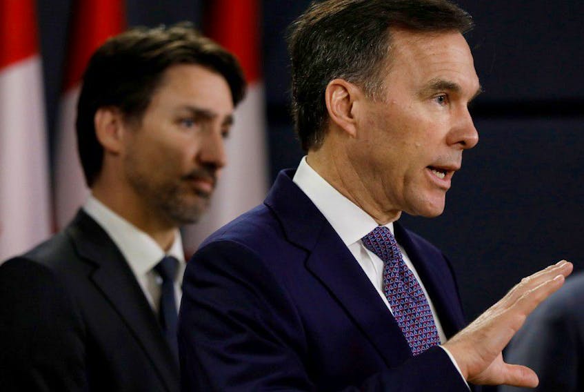 Finance Minister Bill Morneau attends a news conference with Prime Minister Justin Trudeau in Ottawa, Ontario, Canada March 11, 2020. 