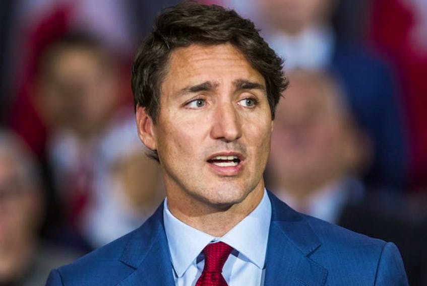 Federal Liberal leader Justin Trudeau, joined by MPs and Liberal candidates, makes an announcement Toronto Don Valley Hotel and Suites in Toronto on Friday, Sept. 20, 2019. (Ernest Doroszuk/Toronto Sun/Postmedia Network)