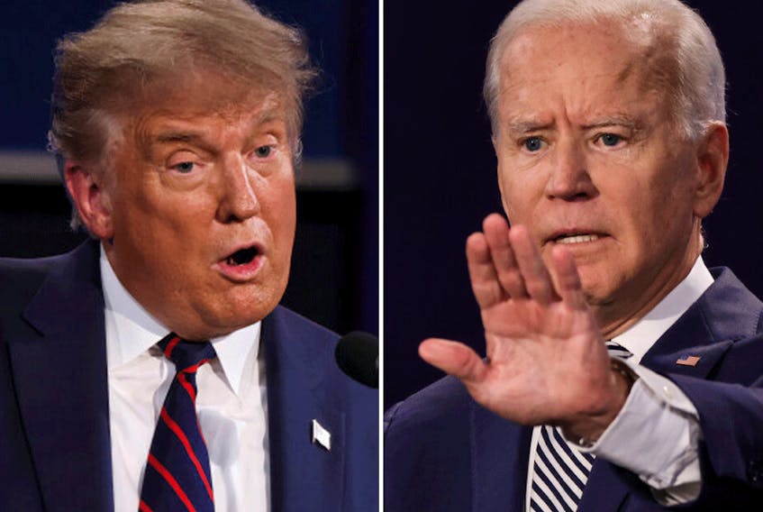 U.S. President Donald Trump, left,  and Democratic presidential nominee Joe Biden participates in the first 2020 presidential campaign debate, in Cleveland, Ohio, on Sept. 29.