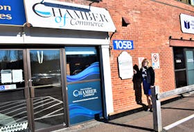 Truro & Colchester Chamber of Commerce executive director Sherry Martell stands beside the entrances to the chamber’s new location on Walker Street. The large signs featuring the chamber’s logo provides a visual presence not enjoyed at the previous location.