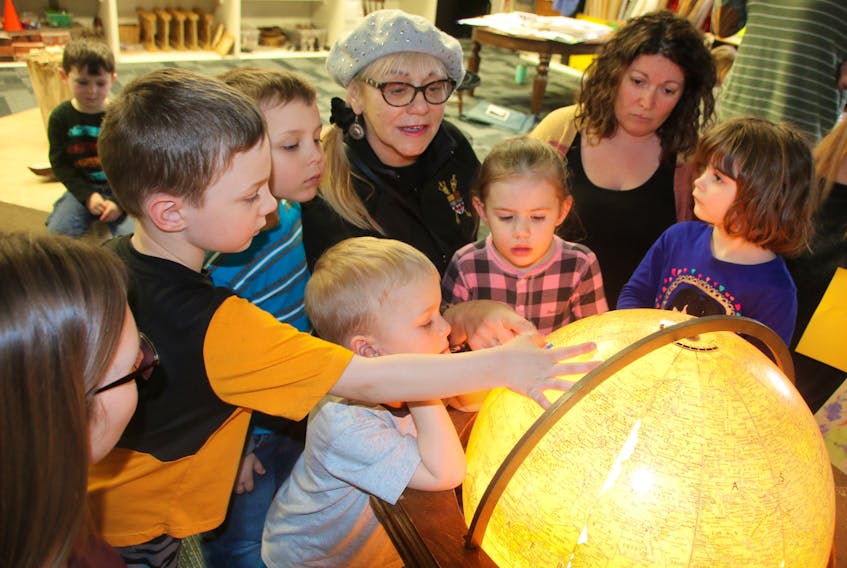 During a visit to the Dr. Jane Norman Child Study Centre, Lenore Zann used a globe to show children the route she and her family travelled when they first came to Canada. The Cumberland Colchester MP also told the children stories and commended them for their efforts to help Australian wildlife. LYNN CURWIN/TRURO NEWS