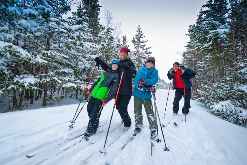 Connor Taylor, left, Beth Pollock, Ian Taylor and Scott Taylor enjoy an outing on the ski trails around the visitor centre in Gros Morne National Park. CONTRIBUTED BY GROS MORNE NATIONAL PARK