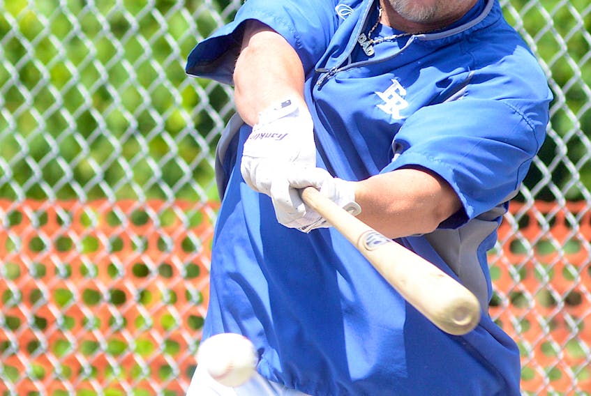 Matt Stairs takes batting practice with the Fredericton Royals prior to a New Brunswick Senior Baseball League doubleheader at Memorial Field in 2013.
