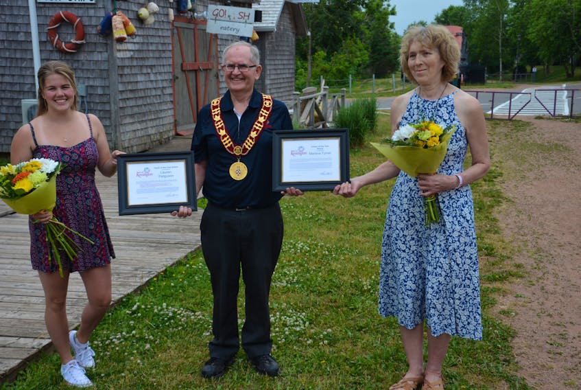 Kensington Mayor Rowan Caseley presents the town’s citizen of the year award to Marlene Turner and the youth of the year award to Lauren Ferguson. The presentations took place during Canada Day celebrations on Wednesday morning. 