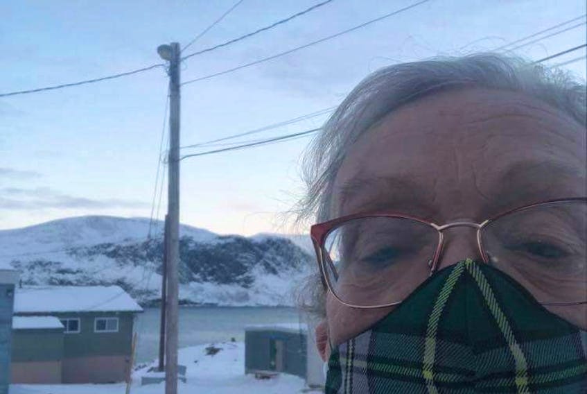 Sherry McIlroy proudly wears her Cape Breton tartan masks as she takes a selfie in her new home community in Nunavut where she lives in the hamlet of Pangniqtuuq. Children's ballet classes started a few weeks ago in the remote, fly-in Inuit community and McIlroy has started a donation drive collecting ballet clothes and shoes. CONTRIBUTED 