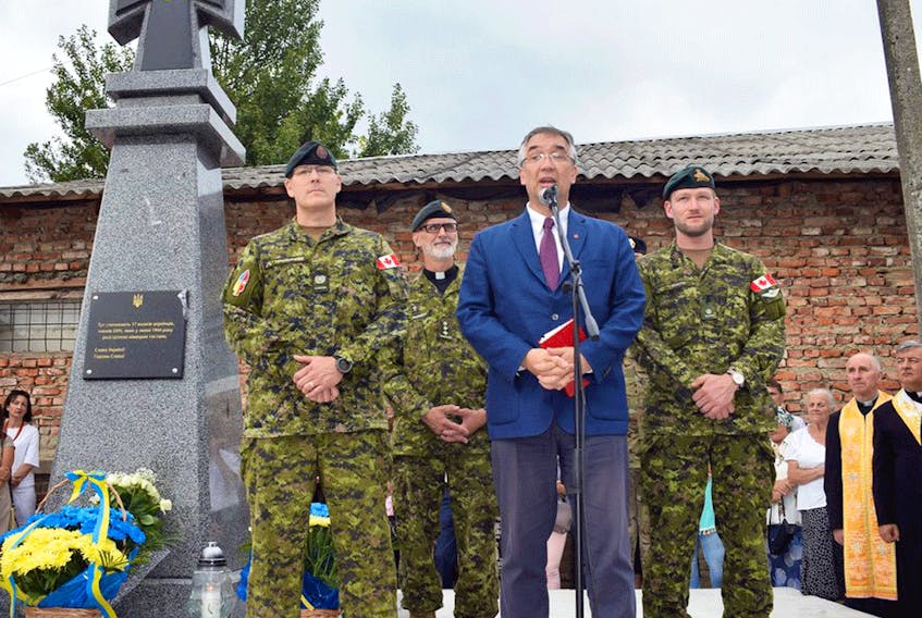 Roman Waschuk, Canada’s Ambassador to Ukraine, along with members of the Canadian Forces honour members of the Organization of Ukrainian Nationalists and the Ukrainian Insurgent Army.