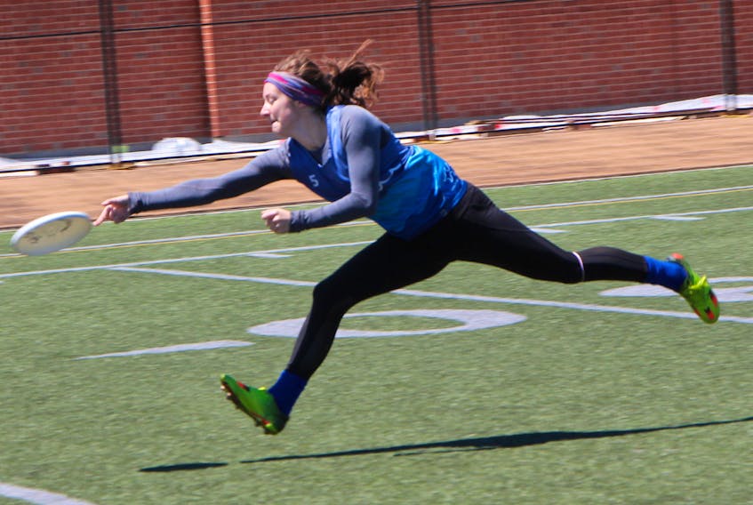 Molly Wedge of Halifax-based Salty 1 chases down and reaches for a disc in Rad Classic playoff action May 27.