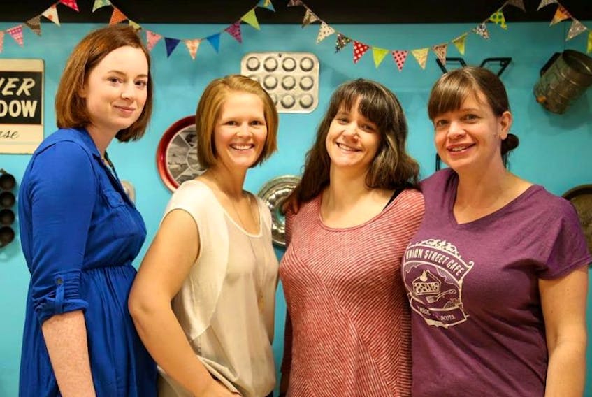 <p>Lauren Franey, far left, and Virginia Fynes, second from left, will be taking over the Union Street Café and Wick Pub in March after purchasing the business from sisters Jenny, far right, and Meagan Osburn.</p>